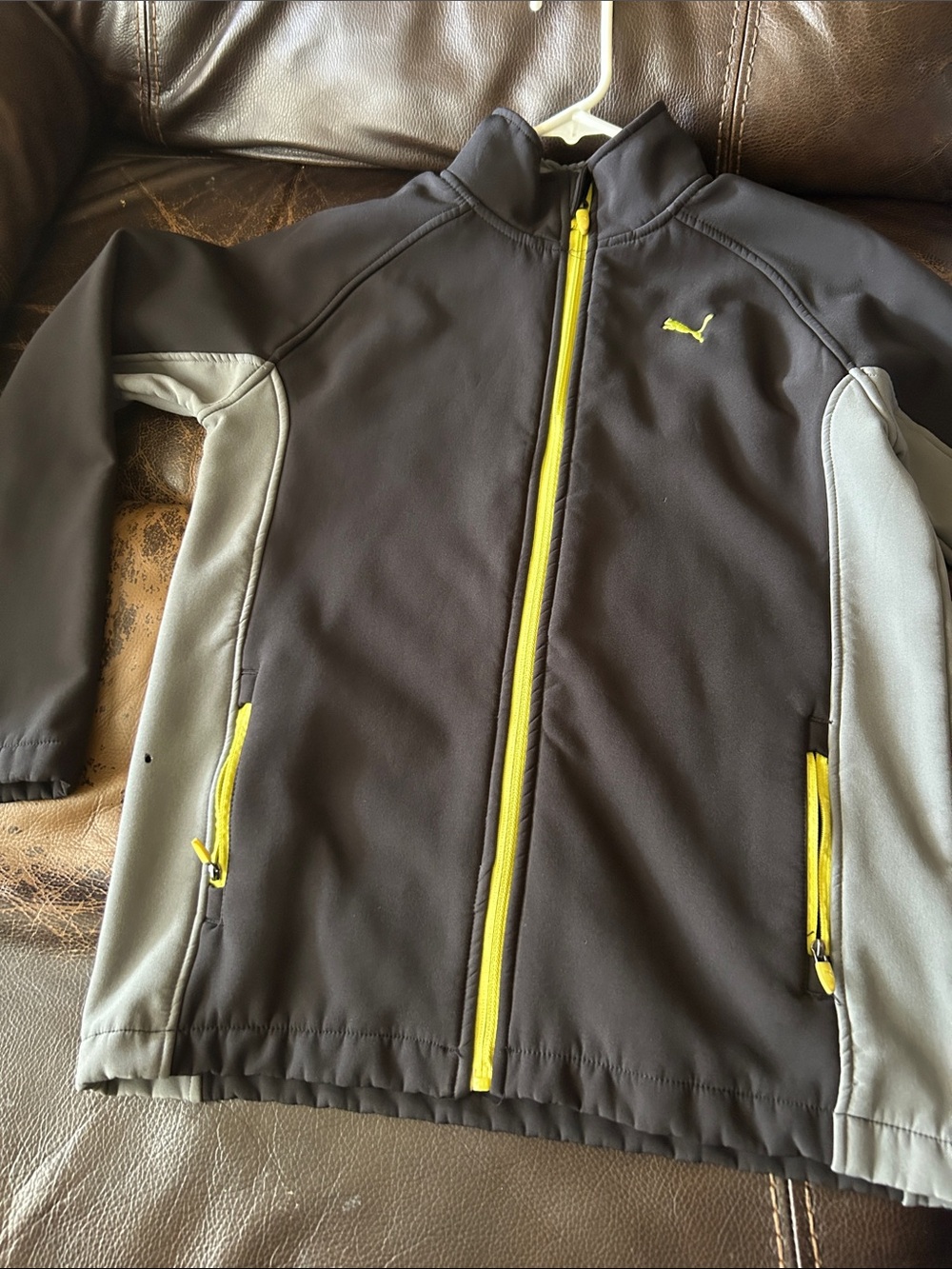 Puma Kids Black and Gray Jacket with Yellow Zipper Accents